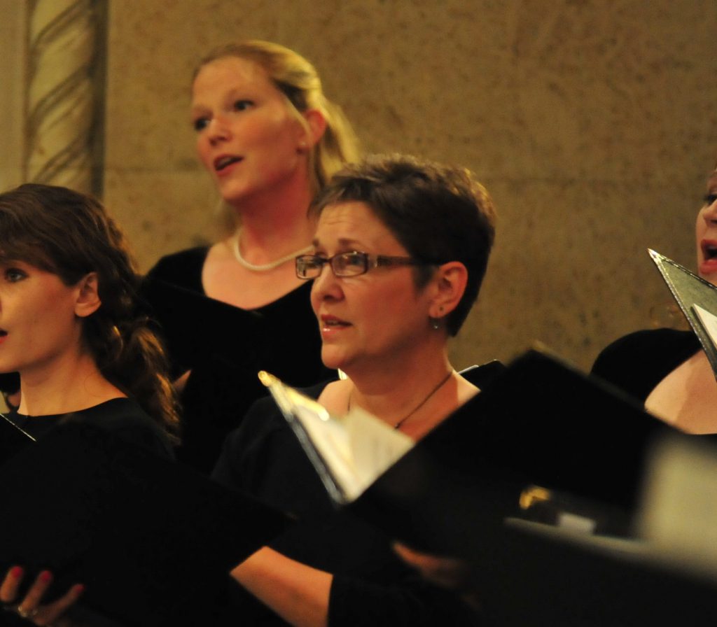 Susan Ramlet singing in a chorus